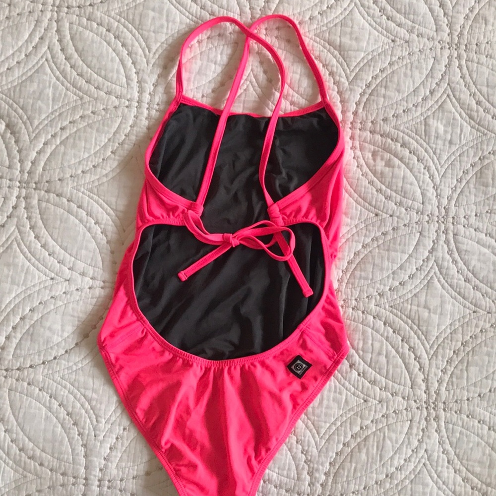 Jolyn tie back one piece hot pink. Excellent condition. No flaws